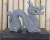 Product image 1 of the product “Reclining dragon, on a wooden base, approx. 16 cm. antique finish, cast lava stone ”